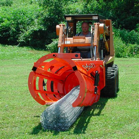 chain link fence attachment skid steer|chain fence skid steer installation.